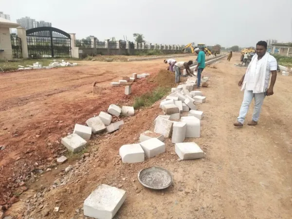 Road divider stone fixing on 24 mtr rd at Sec-89